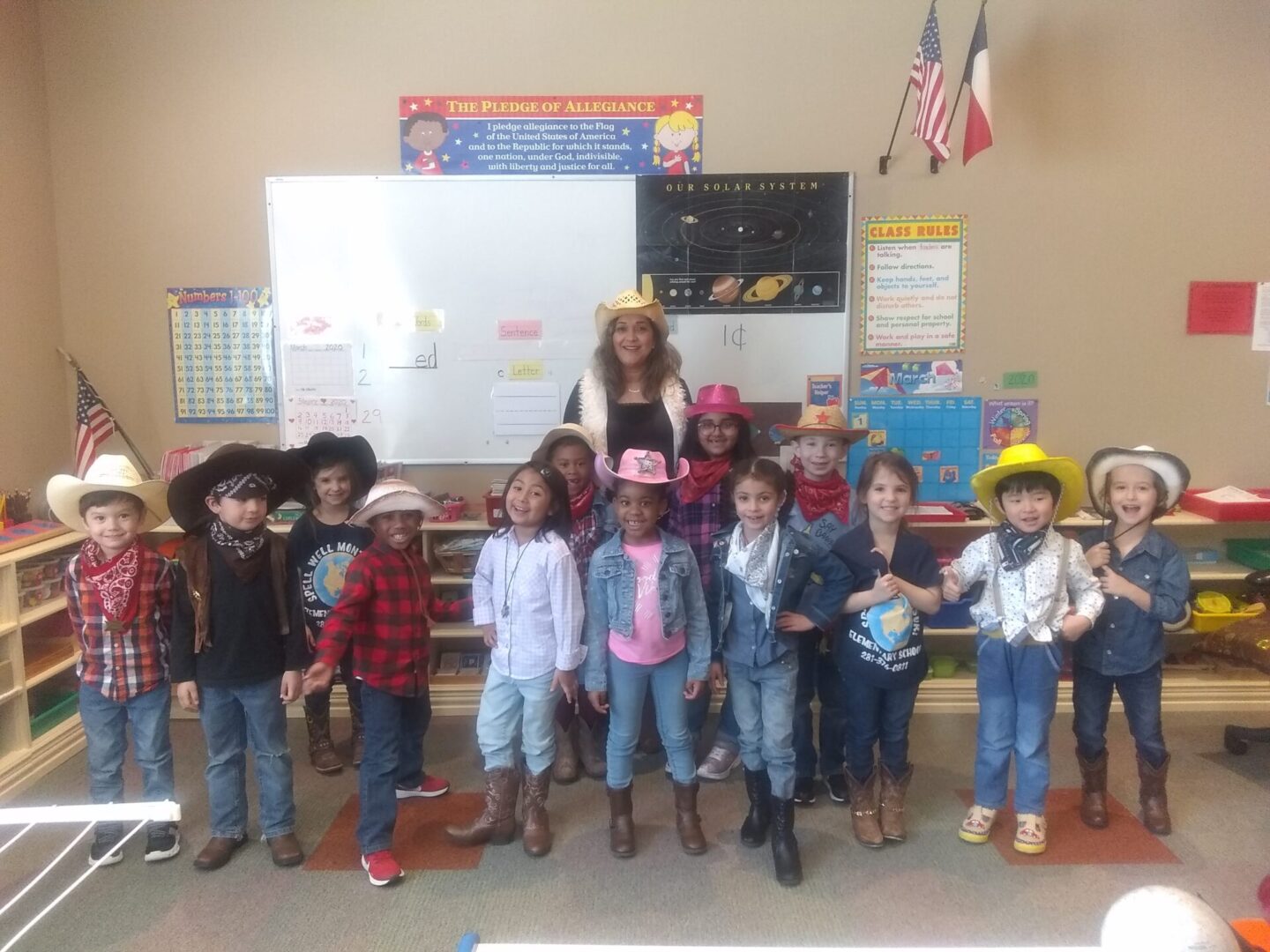 Children wearing cowboy outfits